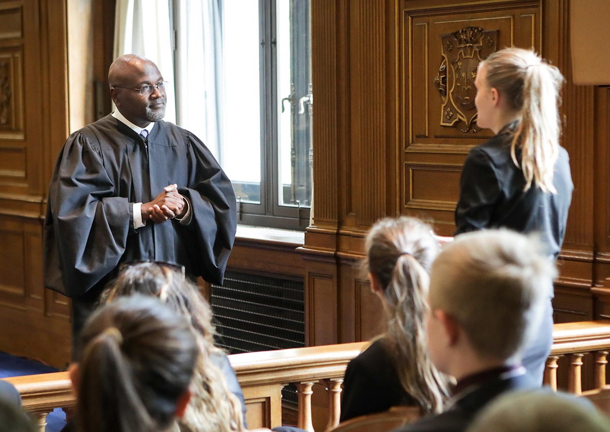 A guest speaker addressing NSLC students